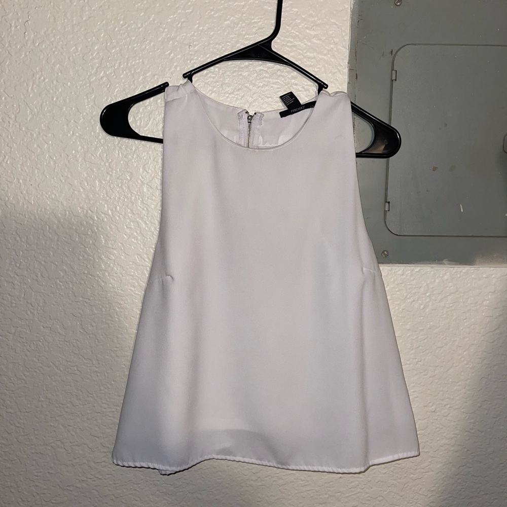 Little blue stain but hardly noticeable! Cute flowey cummerbund shirt!